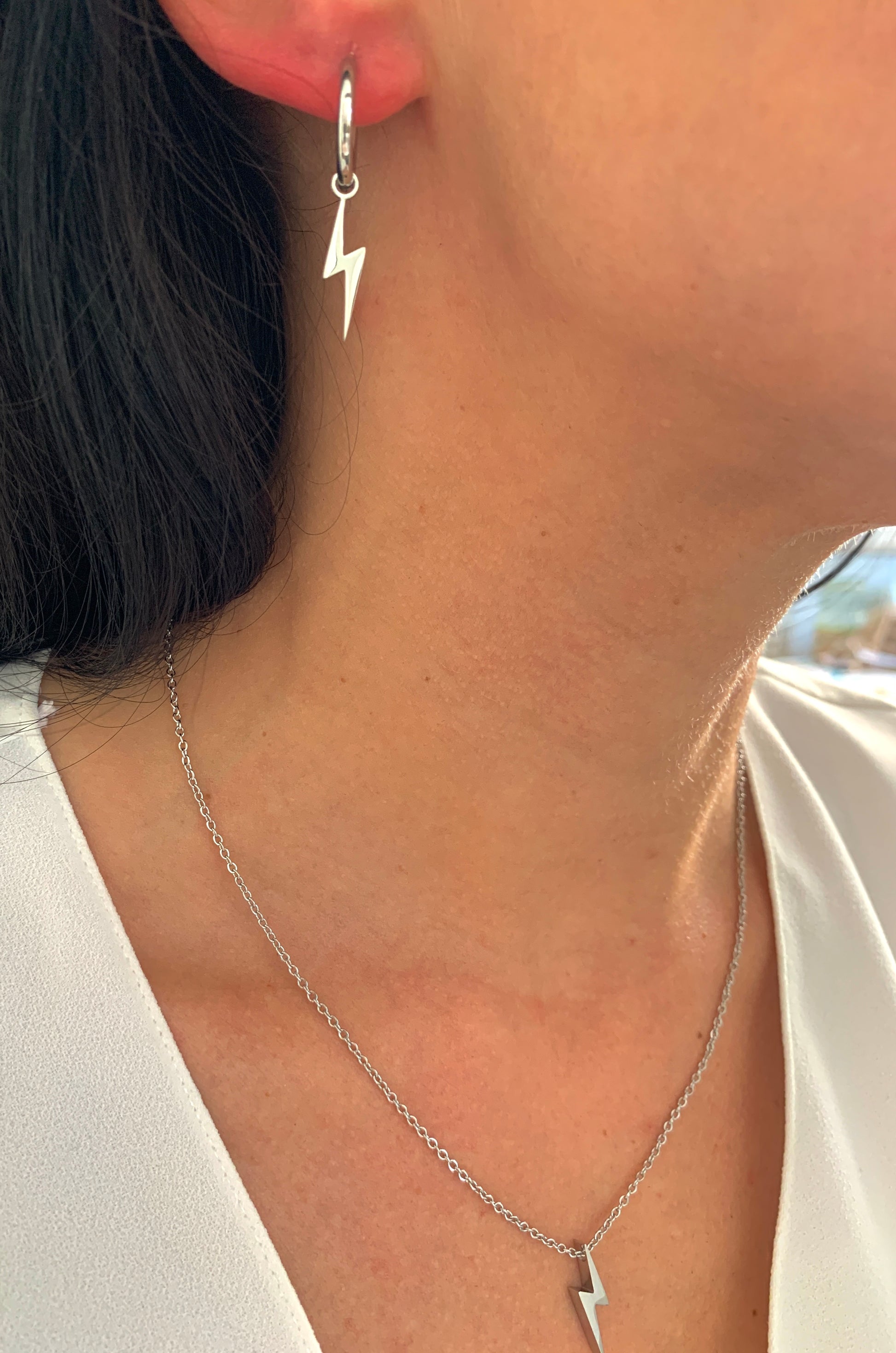 edelstahl-ohrringe-blitzanhaenger-gold-silber-produktansicht-natascha-woge